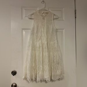 White lace covered dress